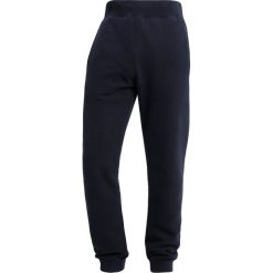 Napapijri MACAU Spodnie treningowe blu marine. Niebieskie spodnie dresowe męskie marki Napapijri, xs, z bawełny, marine. Za 389,00 zł.