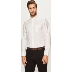 Izod - Koszula. Białe koszule męskie IZOD, s, bez wzorów, z bawełny, casualowe, button down, z długim rękawem. W wyprzedaży za 89,90 zł.