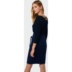 Elegancka bluzka. Bluzki damskie Greenpoint, bez wzorów, z elastanu, eleganckie, bez kołnierzyka, bez rękawów. Za 99,99 zł.