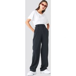 NA-KD Classic Rozszerzane spodnie w prążki - Black. Czarne spodnie damskie NA-KD Classic. Za 202,95 zł.