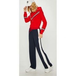 Tommy Hilfiger - Spodnie. Niebieskie spodnie damskie TOMMY HILFIGER, z poliesteru. W wyprzedaży za 319,90 zł.