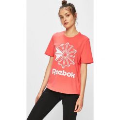 Reebok Classic - Top. Różowe topy damskie Reebok Classic, s, z nadrukiem, z elastanu, z okrągłym kołnierzem. W wyprzedaży za 89,90 zł.