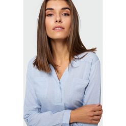 Bluzka z dekoltem V. Bluzki damskie Greenpoint, bez wzorów, z wiskozy, bez kołnierzyka, bez rękawów. Za 79,99 zł.