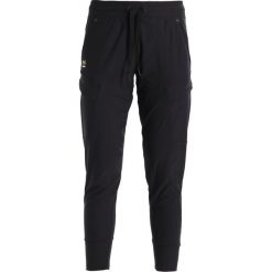 Under Armour PERPETUAL Spodnie treningowe black. Czarne spodnie damskie Under Armour, xs, bez wzorów, z elastanu, długie. Za 419,00 zł.
