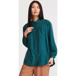 Gładka koszula z lyocellu - Khaki. Brązowe koszule damskie Reserved, bez wzorów, z lyocellu, bez kołnierzyka, bez rękawów. Za 139,99 zł.