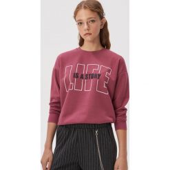 Bluza z hasłem - Różowy. Różowe bluzy damskie Sinsay, s. W wyprzedaży za 24,99 zł.