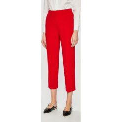 Tommy Hilfiger - Spodnie. Niebieskie spodnie damskie TOMMY HILFIGER, l, z haftami, z elastanu. W wyprzedaży za 219,90 zł.