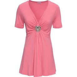 Shirt z odpinaną broszką bonprix pastelowy różowy. Różowe koszulki damskie marki bonprix, bez wzorów, z dekoltem w serek, bez rękawów. Za 74,99 zł.