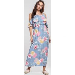 Jasnoniebieska Sukienka Petunia. Niebieskie sukienki damskie other, na lato, s, bez wzorów, eleganckie, bez kołnierzyka, bez rękawów. Za 59,99 zł.
