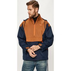 Reebok Classic - Kurtka. Niebieskie płaszcze męskie Reebok Classic, s, bez wzorów, z poliesteru, krótkie, z kapturem. W wyprzedaży za 249,90 zł.