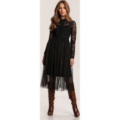 Czarna Sukienka Aeznessa. Czarne sukienki damskie Renee, s, bez wzorów, bez kołnierzyka, bez rękawów, midi. Za 149,99 zł.