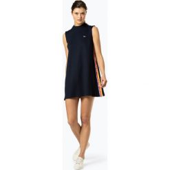 Tommy Jeans - Sukienka damska, niebieski. Niebieskie sukienki damskie Tommy Jeans, m, bez wzorów, z jeansu, sportowe, ze stójką, z krótkim rękawem, krótkie, mini, sportowe. Za 449,95 zł.