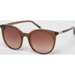Calvin Klein - Okulary CK4355S.201. Żółte okulary przeciwsłoneczne męskie Calvin Klein, z materiału, okrągłe. Za 499,90 zł.