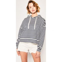 Bluza Tommy Jeans DW0DW08250. Niebieskie bluzy damskie Tommy Jeans, l, bez wzorów, z poliesteru, bez rękawów, bez kaptura. Za 449,00 zł.