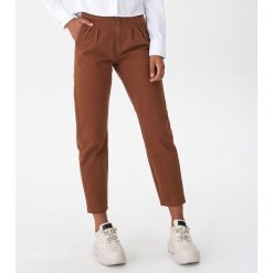 Spodnie chino - Brązowy. Pomarańczowe spodnie damskie House, s. Za 59,99 zł.