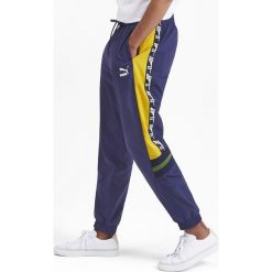 Puma XTG Spodnie dresowe Niebieski. Niebieskie spodnie męskie Puma, xl, bez wzorów, z dresówki. Za 326,95 zł.