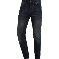 Nudie Jeans TILTED TOR Jeansy Slim Fit indigofera river. Niebieskie jeansy męskie marki Nudie Jeans, m, bez wzorów. Za 629,00 zł.