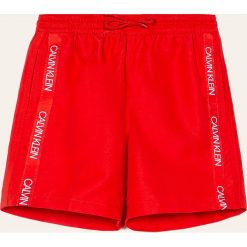 Calvin Klein - Szorty kąpielowe dziecięce 128-176 cm. Niebieskie spodenki chłopięce Calvin Klein, z nadrukiem, z poliesteru. Za 199,90 zł.