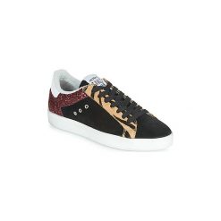 Buty Meline ZEBRINO. Czarne trampki i tenisówki damskie Meline, bez wzorów, bez zapięcia. Za 479,00 zł.