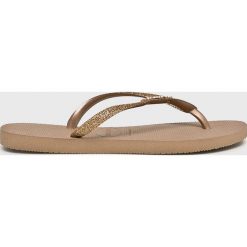 Havaianas - Japonki. Żółte klapki damskie Havaianas, bez wzorów, z materiału, bez obcasa. W wyprzedaży za 89,90 zł.