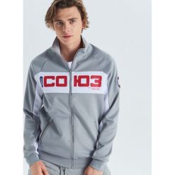 Bluza track jacket z kolekcji Apollo/Soyuz - Jasny szary. Szare bluzy męskie marki Cropp, s, bez wzorów, bez kołnierzyka, bez rękawów, bez kaptura. Za 119,99 zł.