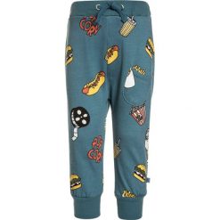 Småfolk PANTS WITH CINEMA Spodnie treningowe bluestone. Niebieskie spodnie dresowe dziewczęce marki Småfolk, z bawełny. Za 169,00 zł.