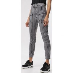 Szaro-Czarne Spodnie Mareia. Szare jeansy damskie Born2be, xl, z podwyższonym stanem. Za 49,99 zł.