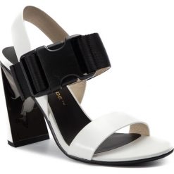 Sandały UNITED NUDE - Molten Sandal Hi 1043804119 White. Czarne klapki damskie United Nude, bez wzorów, ze skóry, bez obcasa, na obcasie. W wyprzedaży za 459,00 zł.
