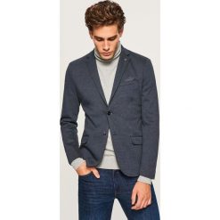 Dzianinowa marynarka z łatami na łokciach - Niebieski. Niebieskie marynarki męskie slim fit Reserved, z dzianiny. Za 229,99 zł.