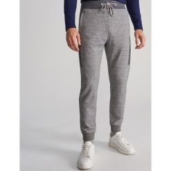 Melanżowe joggery z lampsami - Jasny szary. Szare spodnie męskie Reserved, s, bez wzorów. Za 119,99 zł.