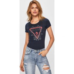 Guess Jeans - Top. Białe bluzki damskie Guess Jeans, s, z nadrukiem, z bawełny, z okrągłym kołnierzem. W wyprzedaży za 99,90 zł.