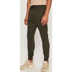 G-Star Raw - Spodnie. Pomarańczowe spodnie męskie G-Star RAW, s, bez wzorów, z bawełny, retro. Za 369,90 zł.