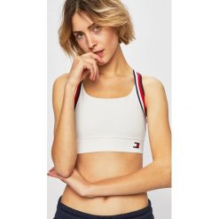 Tommy Sport - Biustonosz. Białe biustonosze sportowe damskie Tommy Sport, s, bez wzorów, z elastanu. W wyprzedaży za 139,90 zł.