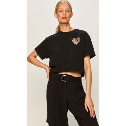 Converse - T-shirt. Czarne bluzki damskie Converse, s, z nadrukiem, z bawełny, casualowe, z okrągłym kołnierzem. W wyprzedaży za 89,90 zł.