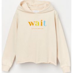 Bawełniana bluza z aplikacją - Beżowy. Brązowe bluzy damskie Reserved, z aplikacjami, z bawełny, bez rękawów, bez kaptura. W wyprzedaży za 29,99 zł.