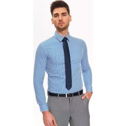 Koszula w paski slim fit. Niebieskie koszule męskie Top Secret, na lato, m, w paski, z tkaniny, eleganckie, bez kołnierzyka, z długim rękawem. W wyprzedaży za 39,99 zł.