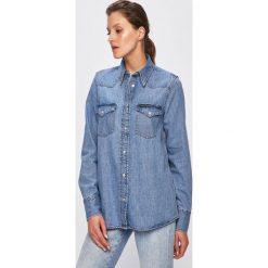 Calvin Klein Jeans - Koszula. Niebieskie bluzki damskie Calvin Klein Jeans, na co dzień, xs, bez wzorów, z bawełny, klasyczne, z klasycznym kołnierzykiem, z długim rękawem. Za 339,90 zł.