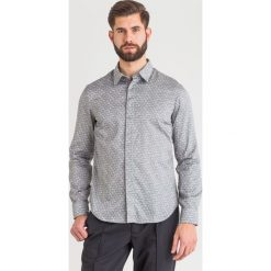 KOSZULA emporio armani. Koszule męskie Emporio Armani, s, bez wzorów, eleganckie, bez kołnierzyka, bez rękawów. W wyprzedaży za 433,30 zł.