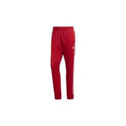 Spodnie treningowe adidas Spodnie dresowe SST. Czerwone spodnie dresowe męskie marki Adidas, s, z dresówki. Za 279,00 zł.