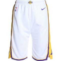 Nike Performance SWINGMAN ASSOCIATION SHORT Krótkie spodenki sportowe yellow. Żółte spodenki chłopięce Nike Performance, z materiału, sportowe. W wyprzedaży za 127,20 zł.