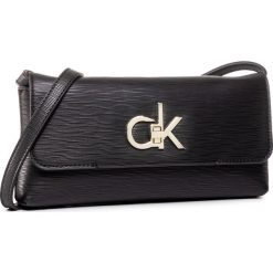 Torebka CALVIN KLEIN - Re-Lock Clutch Md Ep K60K60650 BAX. Czarne listonoszki damskie Calvin Klein, na co dzień, bez wzorów, ze skóry ekologicznej, bez dodatków. W wyprzedaży za 359,00 zł.