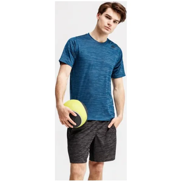Adidas Koszulka Ss Fl Tec Z Ft Hea , niebieski, rozmiar XL. Niebieskie koszulki męskie Adidas, xl, bez wzorów, ze skóry, sportowe, bez kołnierzyka, bez rękawów. W wyprzedaży za 99,99 zł.