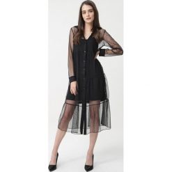 Czarna Sukienka Claudia. Czarne sukienki damskie Born2be, s, w kropki, klasyczne, długie, midi, koszulowe. Za 119,99 zł.