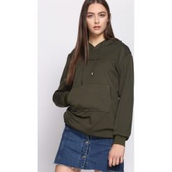 Ciemnozielona Bluza Faction. Zielone bluzy rozpinane damskie Born2be, l, z kapturem. Za 64,99 zł.