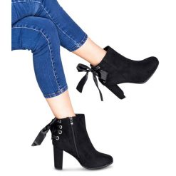 Botki damskie Abloom A852 Czarne. Czarne botki damskie ABLOOM, z tworzywa sztucznego, eleganckie, bez obcasa, na obcasie, na zamek. Za 80,00 zł.