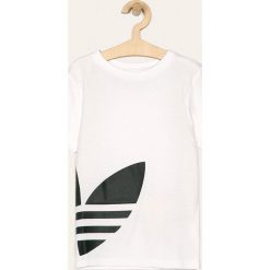 Adidas Originals - T-shirt dziecięcy 128-164 cm. Białe bluzki dziewczęce adidas Originals, z nadrukiem, z bawełny, z okrągłym kołnierzem, z krótkim rękawem, krótkie, bez kaptura. Za 79,90 zł.