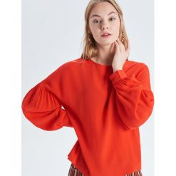 Gładka bluzka z wiskozy - Pomarańczowy. Pomarańczowe bluzki damskie marki Cropp, s, bez wzorów, z wiskozy, bez kołnierzyka, bez rękawów. Za 79,99 zł.