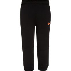 Nike Performance DRY PANT TAPER Spodnie treningowe black/hyper crimson. Czarne spodnie chłopięce marki Nike Performance, z materiału. W wyprzedaży za 127,20 zł.
