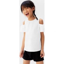 Mango Kids - T-shirt dziecięcy Shoulder 110-164 cm. Białe bluzki dziewczęce Mango Kids, bez wzorów, z bawełny, z okrągłym kołnierzem, z krótkim rękawem, krótkie, bez kaptura. Za 45,90 zł.