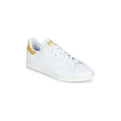 Buty adidas STAN SMITH. Białe trampki i tenisówki damskie Adidas, bez wzorów, bez zapięcia. Za 479,00 zł.